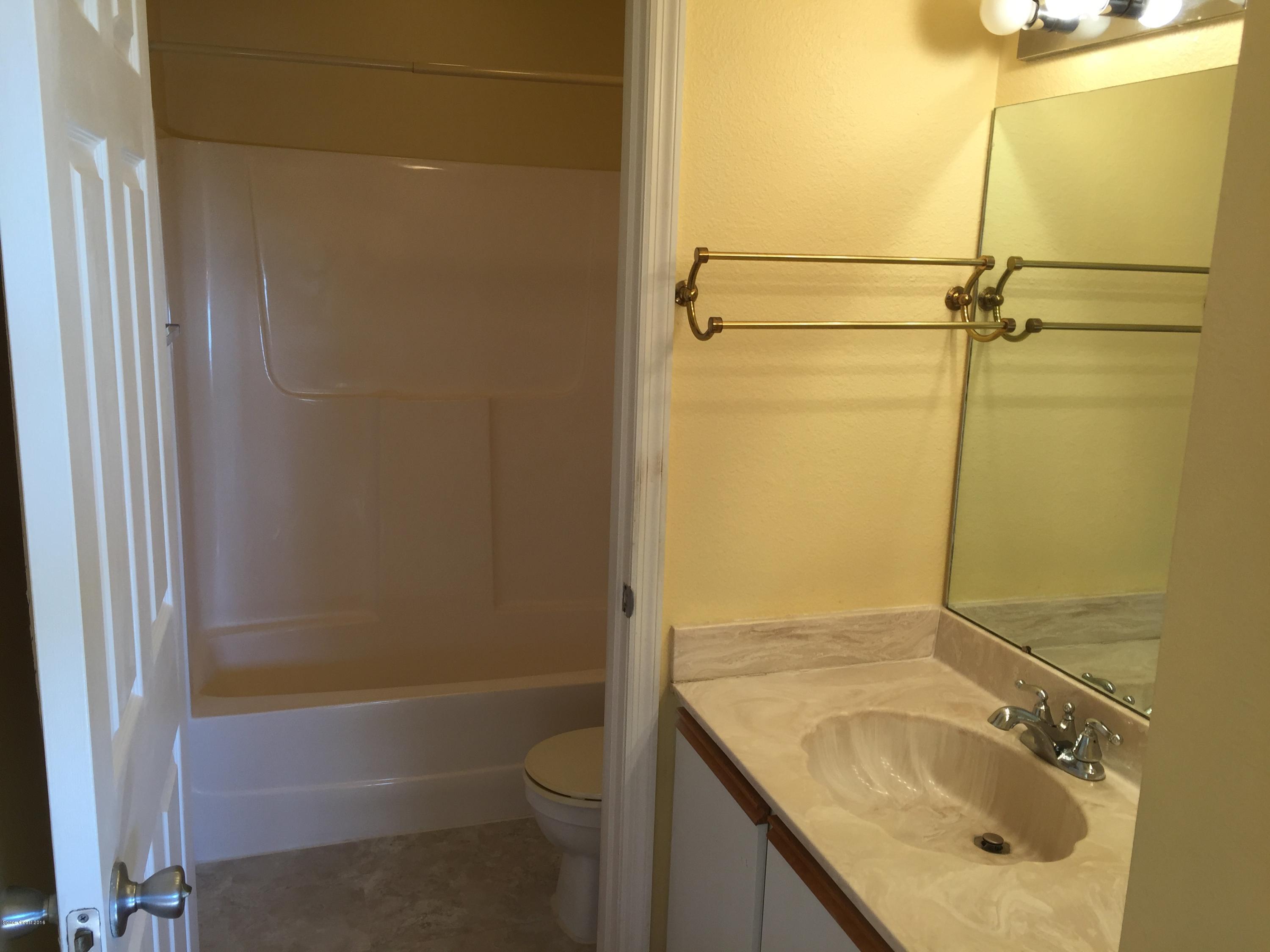 1940 Quail Ridge Court, Unit 404 Cocoa, FL 32926 - Photo 8 of 12 Bathroom1