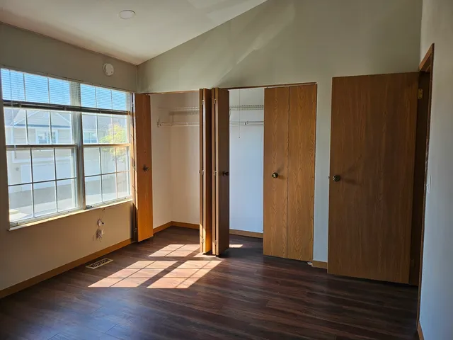 a view of a house with wooden deck