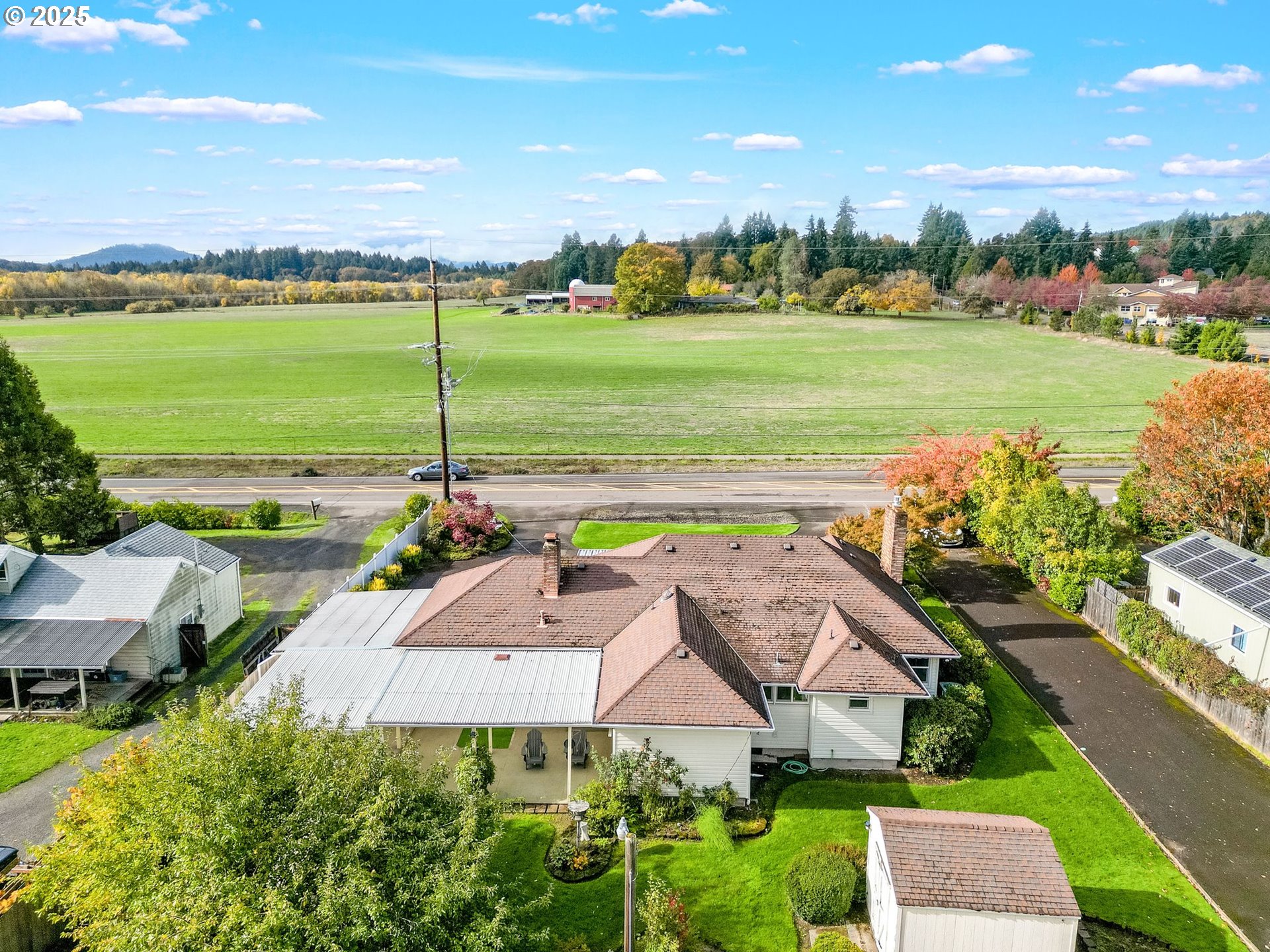 1045 Southwest 53rd Street Corvallis, OR 97333 - Photo 14 of 48 a view of a garden with an ocean