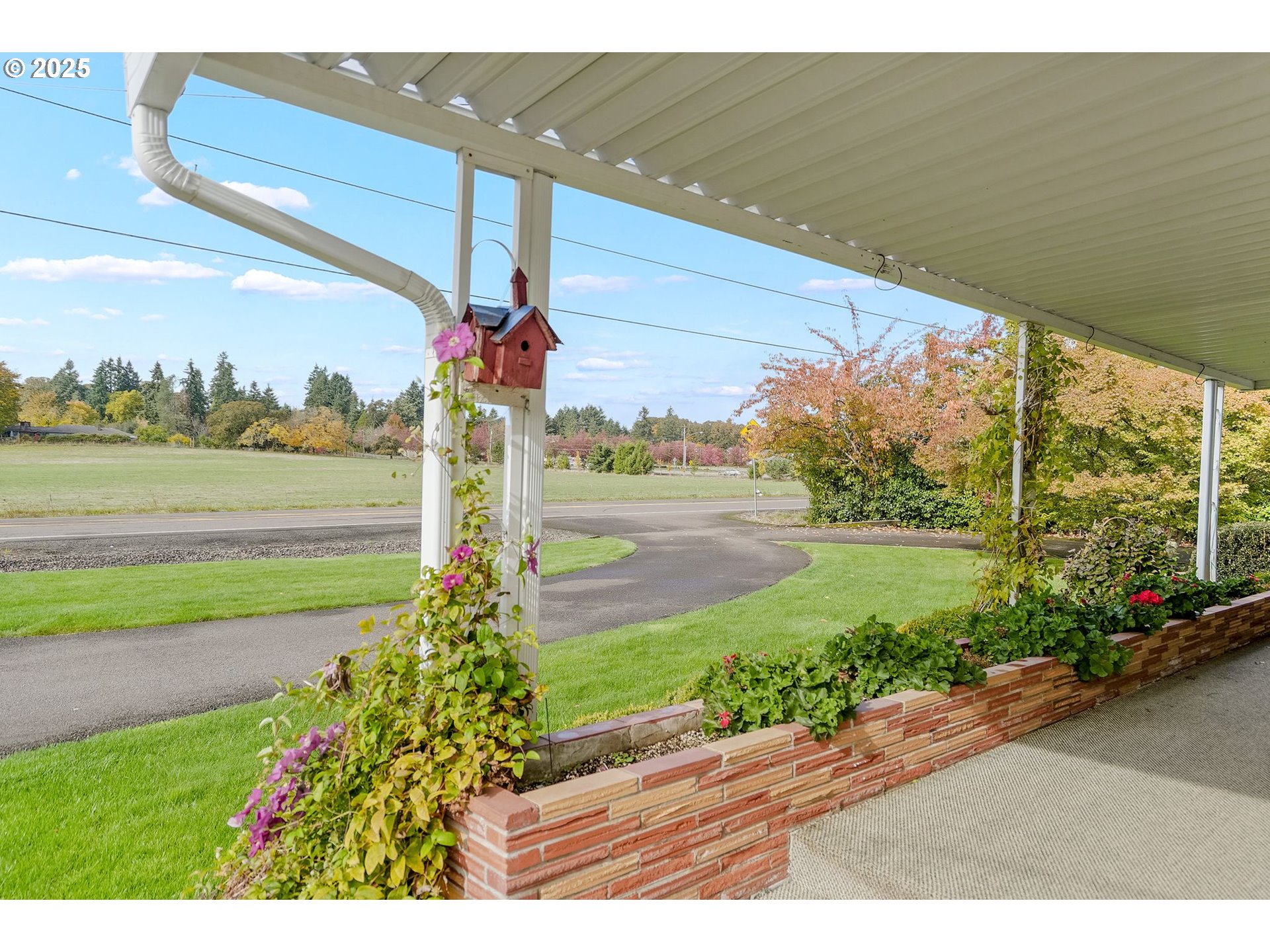 1045 Southwest 53rd Street Corvallis, OR 97333 - Photo 17 of 48 a view of a garden with an ocean view