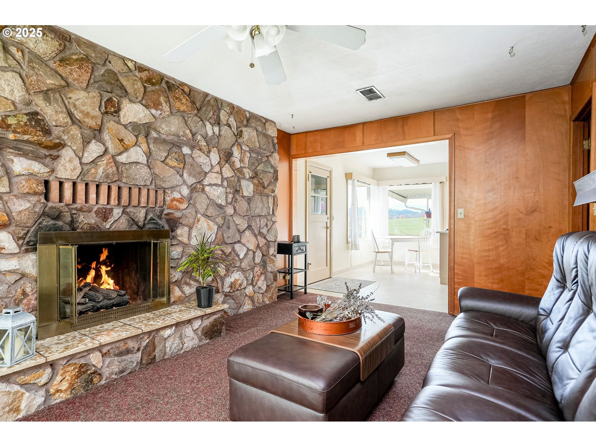 1045 Southwest 53rd Street Corvallis, OR 97333 - Photo 29 of 48 a living room with furniture and a fireplace