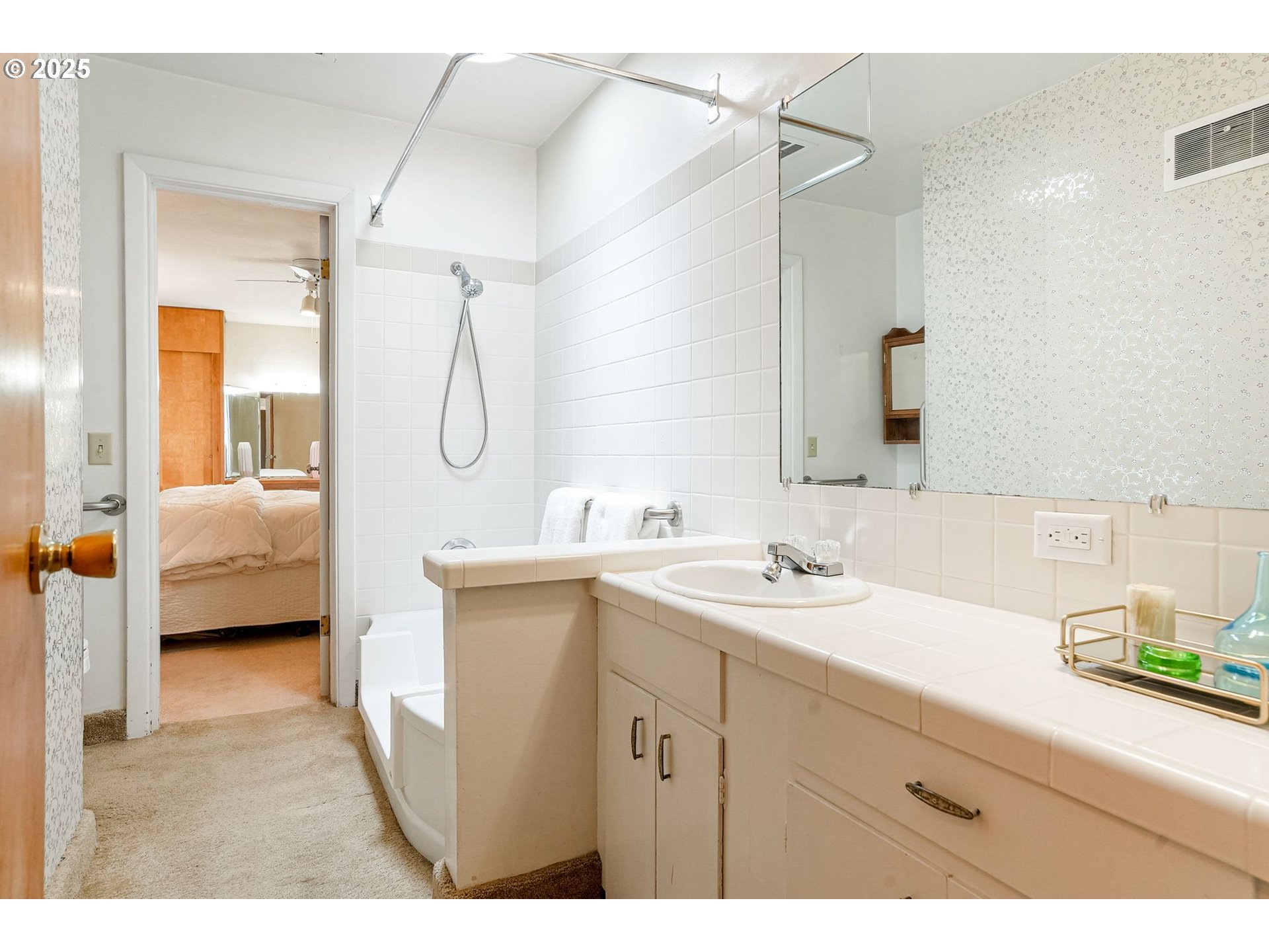 1045 Southwest 53rd Street Corvallis, OR 97333 - Photo 37 of 48 a en suite bathroom with a sink double vanity and a mirror