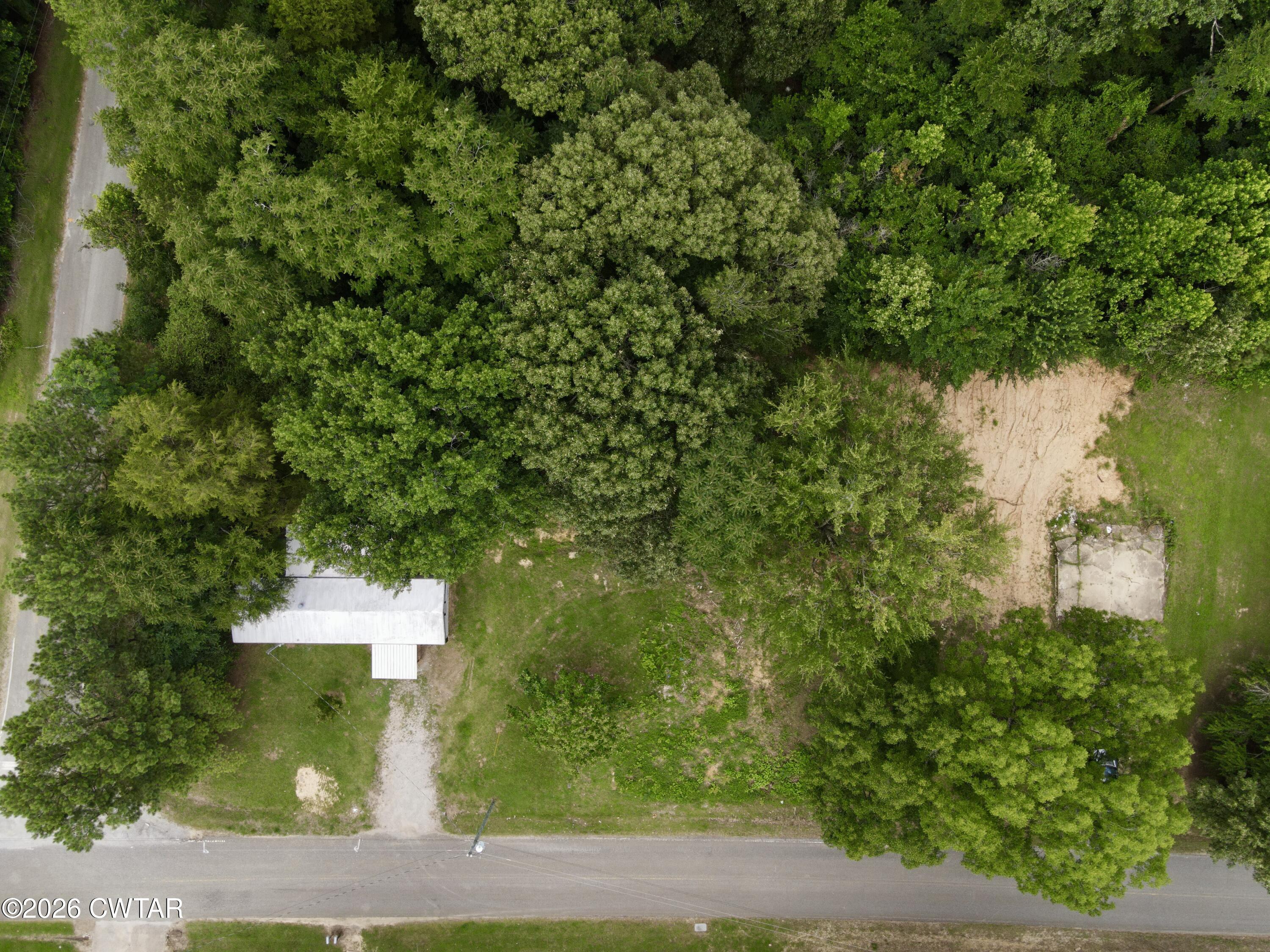 163 Walnut Grove Road Milan, TN 38358 - Photo 20 of 31 dji_fly_20260616_171202_179_178164794730