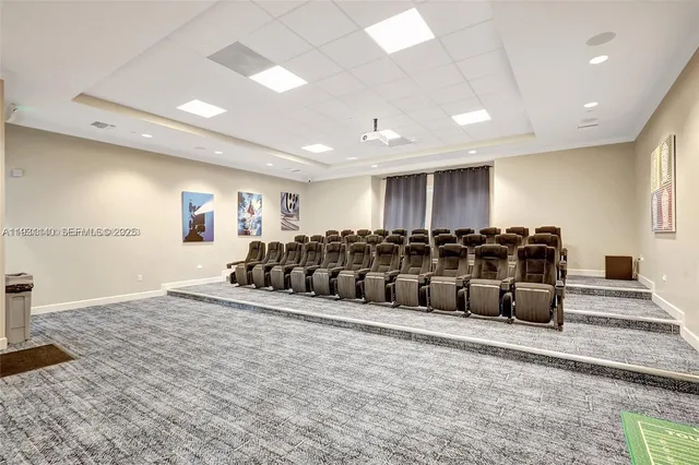 a large room with lots of table and a couch