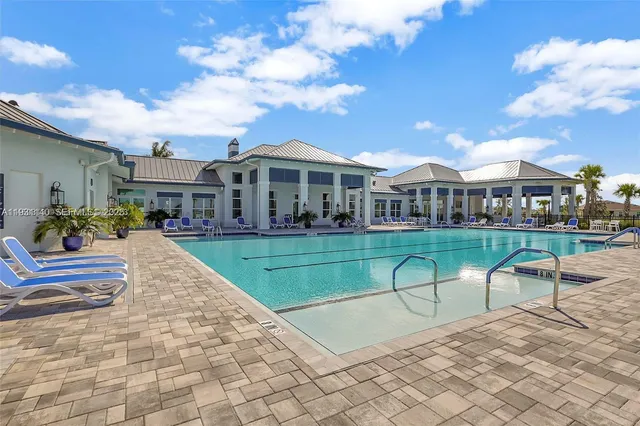 a view of house with outdoor space and porch