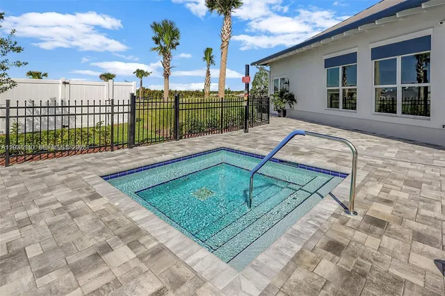 a view of a backyard with a patio