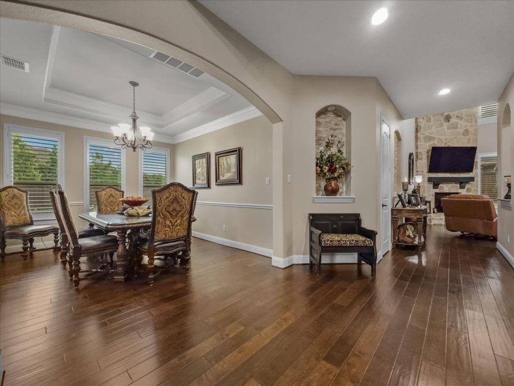 2832 Mona Vale Road Trophy Club, TX 76262 - Photo 14 of 37 a view of a dining room with furniture window and wooden floor