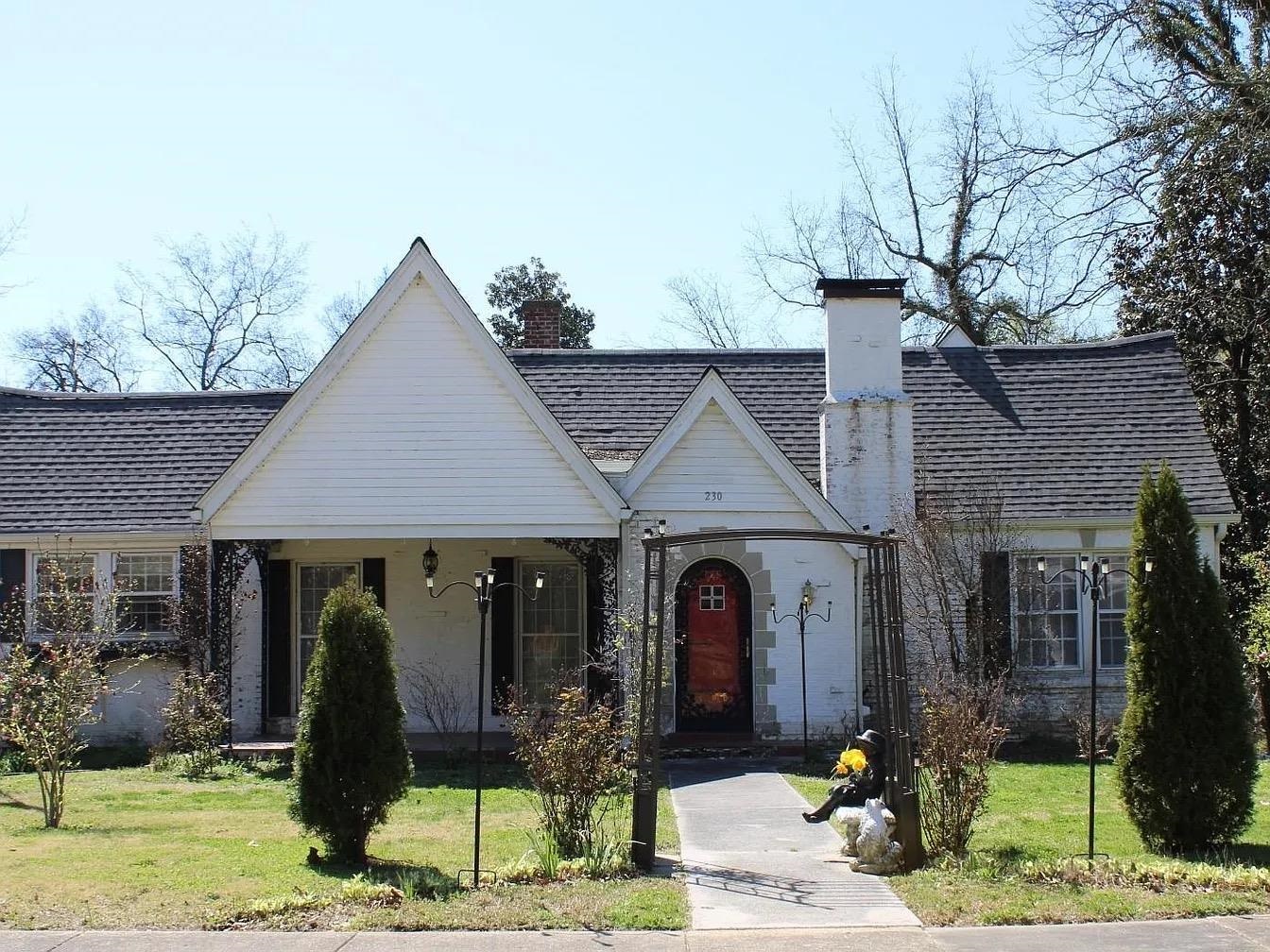 230 Lake Drive Ripley, TN 38063 - Photo 1 of 24 a front view of a house with garden