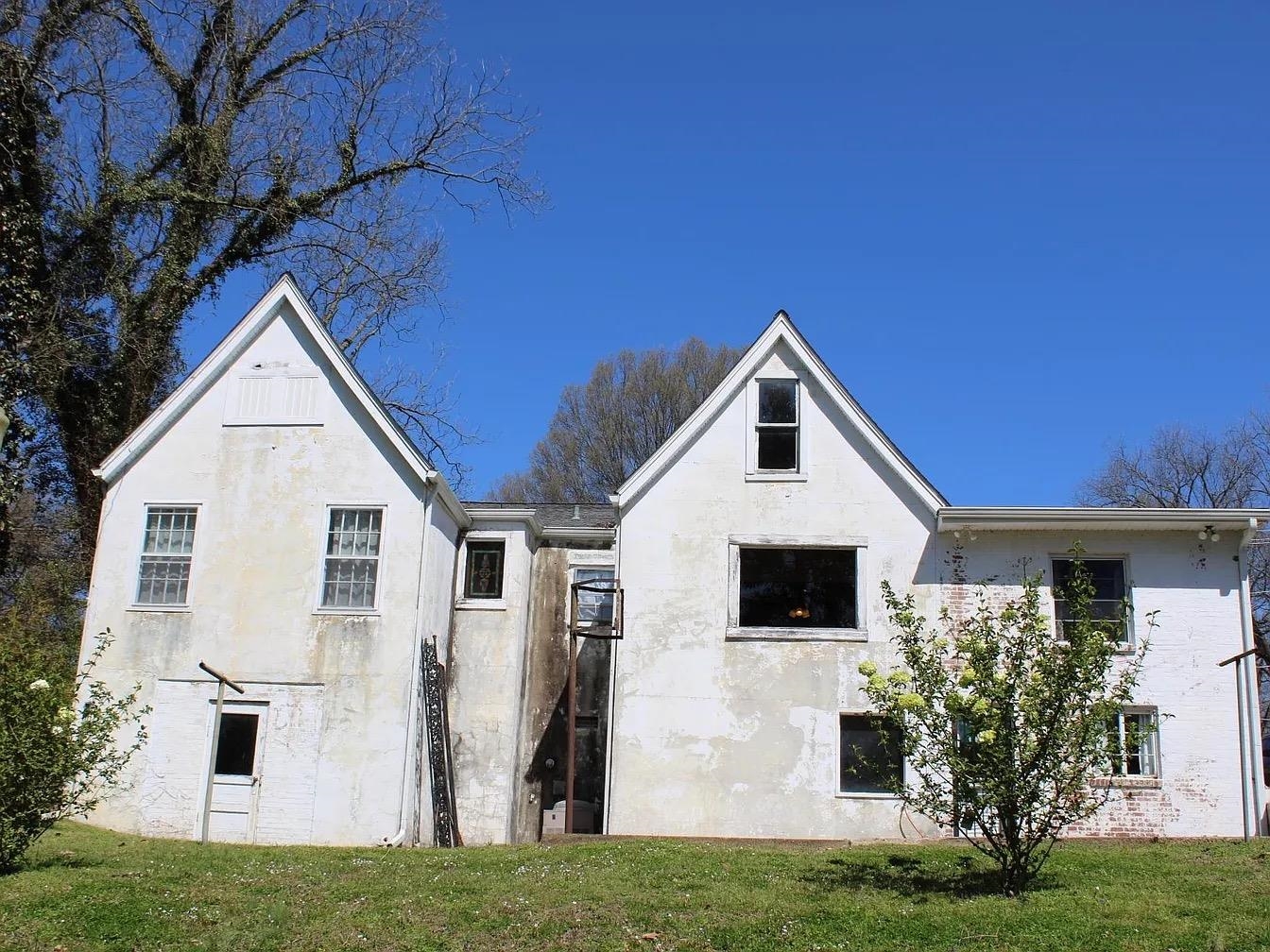 230 Lake Drive Ripley, TN 38063 - Photo 22 of 24 a front view of a house with a yard