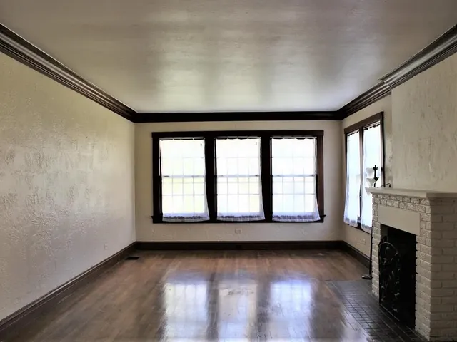 a stove top oven sitting inside of a kitchen