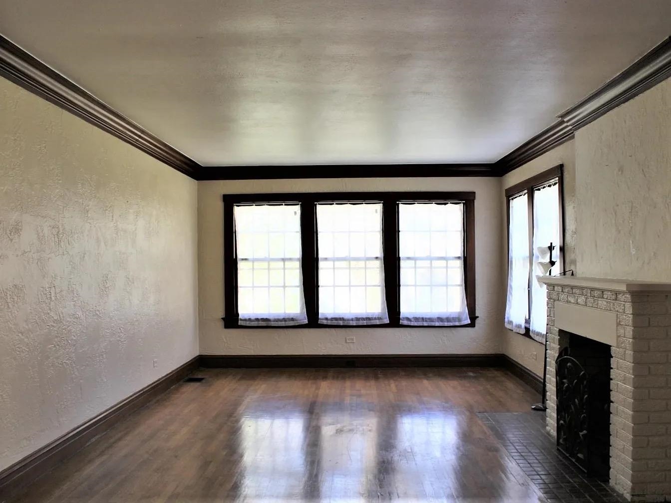 230 Lake Drive Ripley, TN 38063 - Photo 4 of 24 wooden floor in an empty room with a window