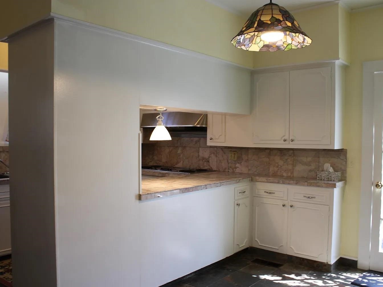 230 Lake Drive Ripley, TN 38063 - Photo 9 of 24 a kitchen with a sink and cabinets