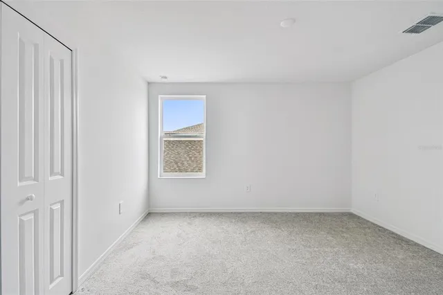 a bathroom with a shower and a toilet
