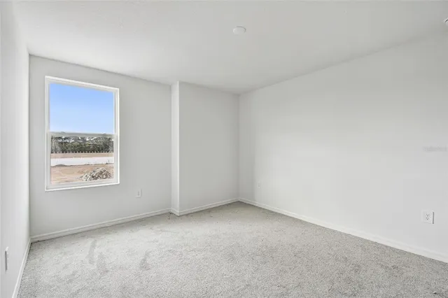 an empty room with a natural light