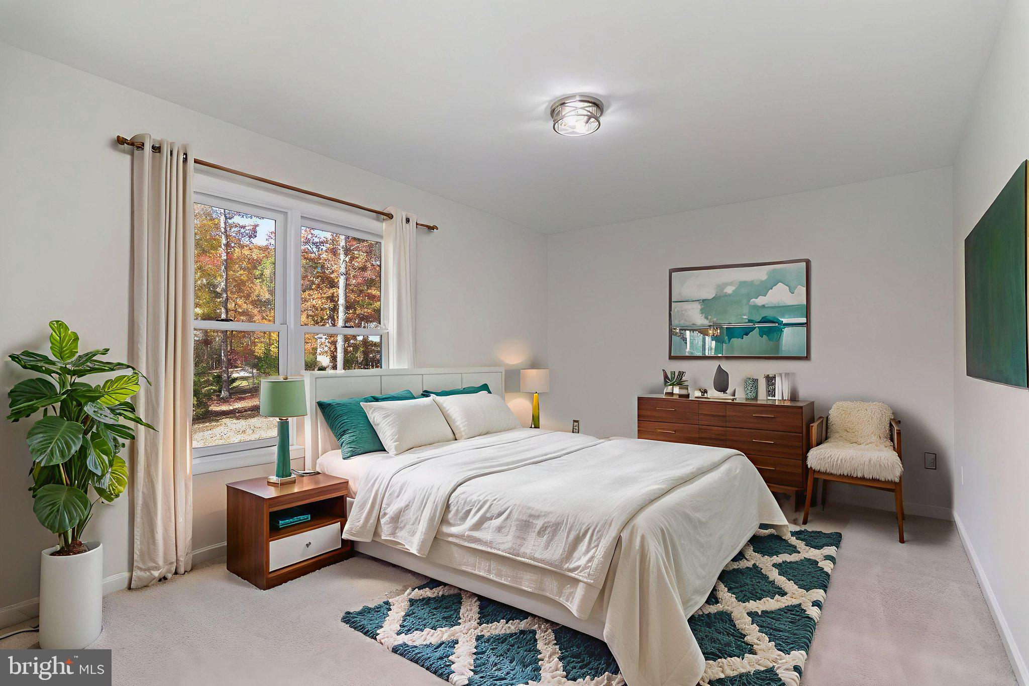 1923 Hensley Road Mineral, VA 23117 - Photo 19 of 62 a bedroom with a bed and a couch