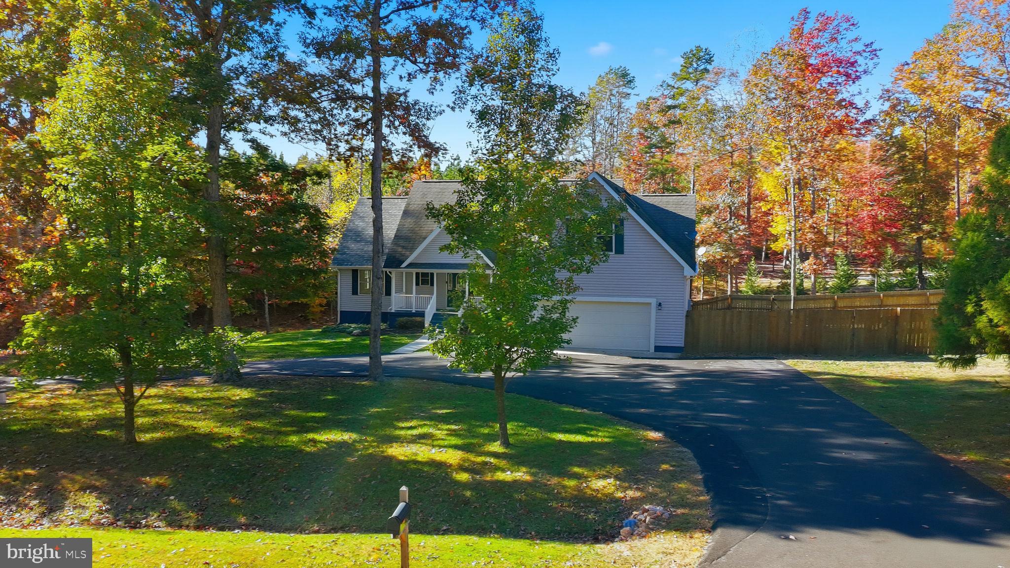 1923 Hensley Road Mineral, VA 23117 - Photo 2 of 62 a backyard of a house with lots of green space