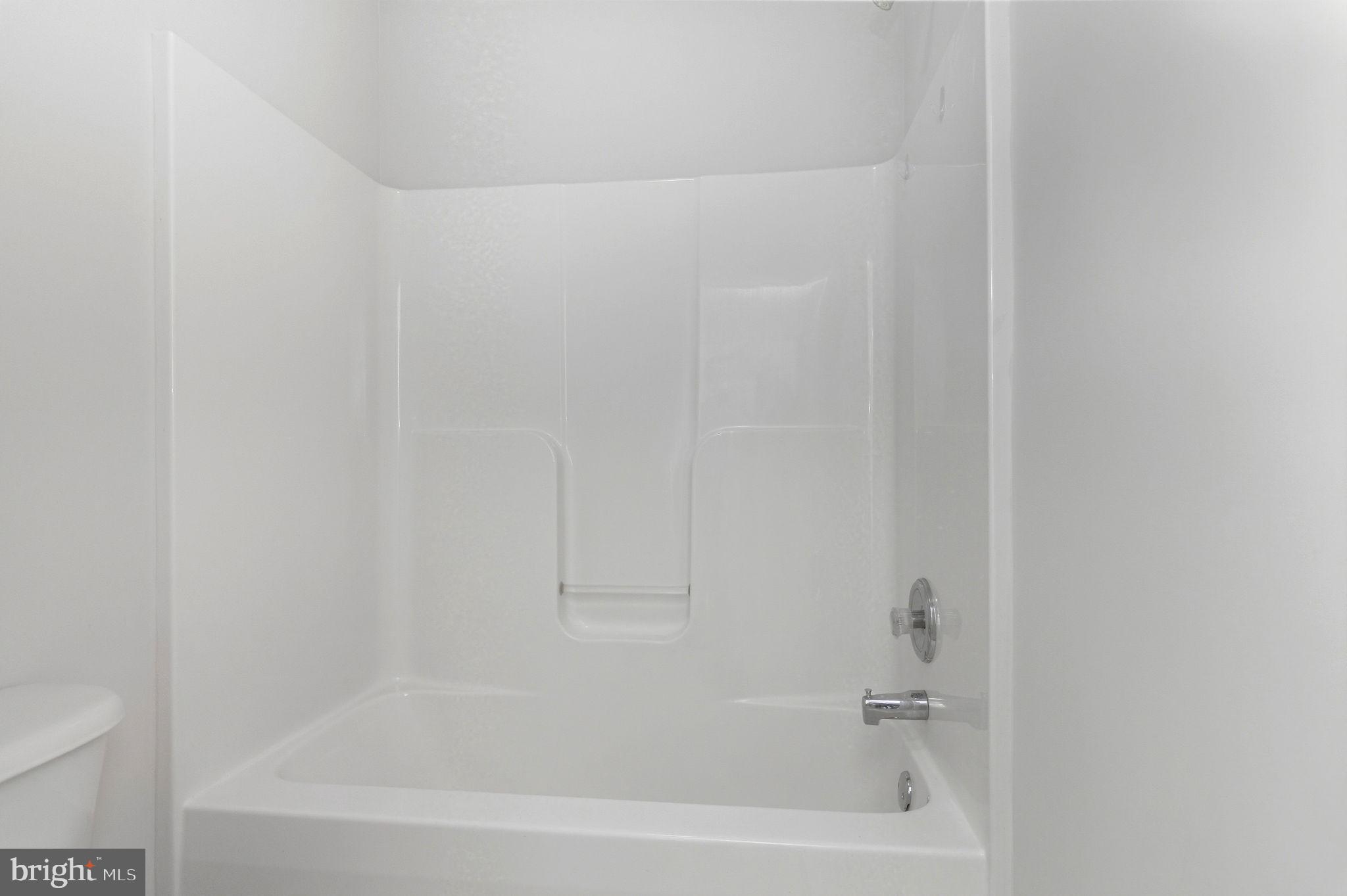 1923 Hensley Road Mineral, VA 23117 - Photo 21 of 62 a close up of a bathtub in a bathroom