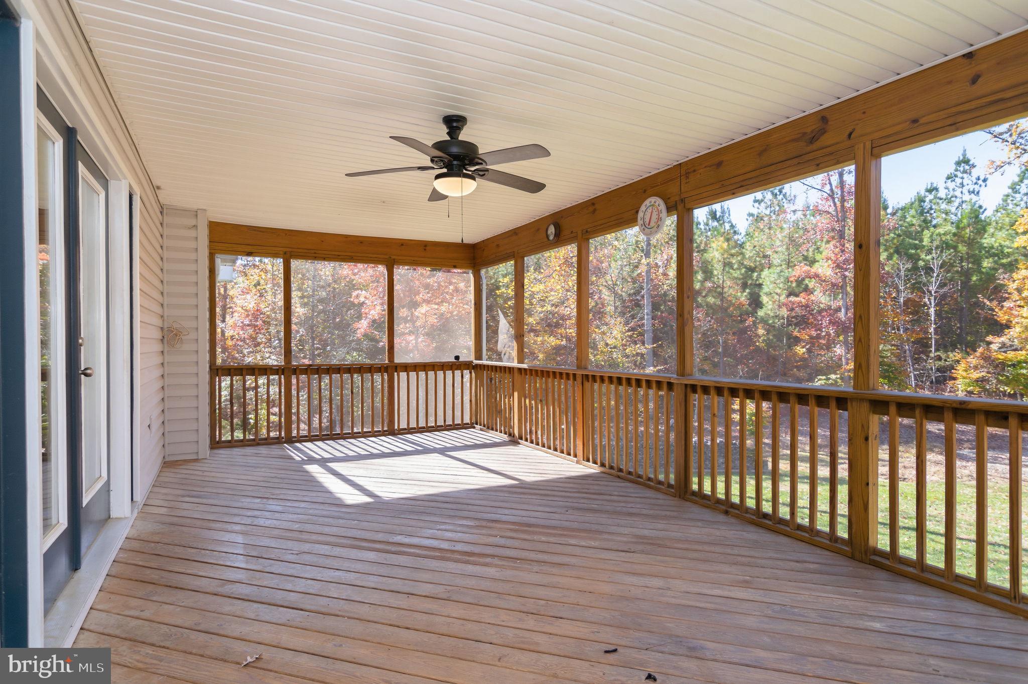 1923 Hensley Road Mineral, VA 23117 - Photo 29 of 62 a view of porch with wooden floor and outdoor space