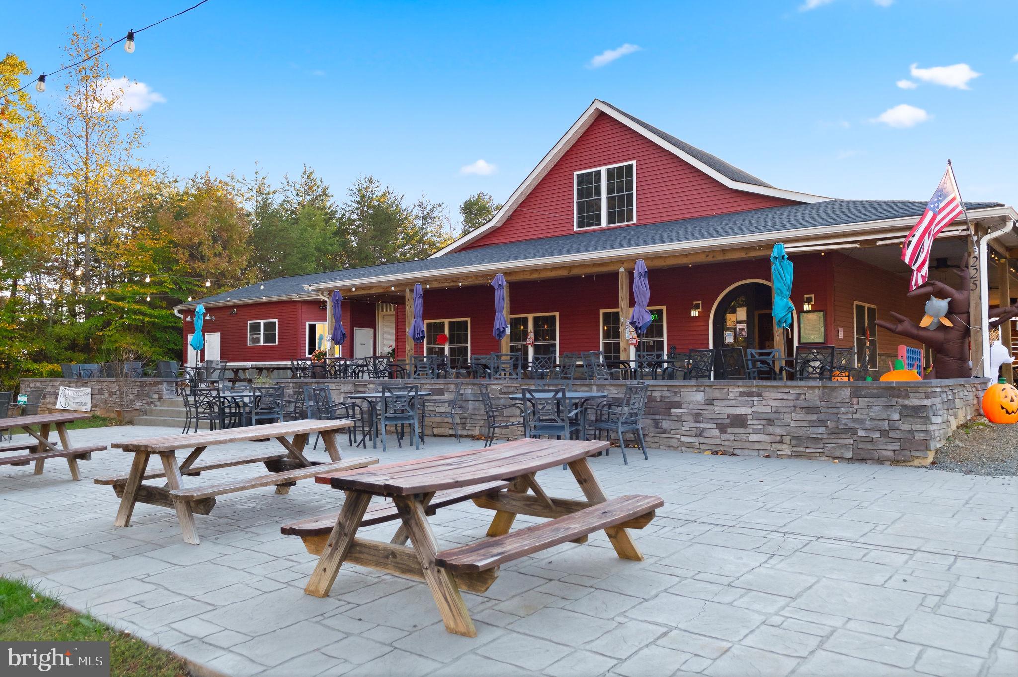 1923 Hensley Road Mineral, VA 23117 - Photo 56 of 62 a view of a house with backyard and sitting area