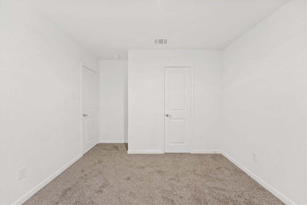 605 Spur Ridge Princeton, TX 75407 - Photo 21 of 30 a view of an empty room
