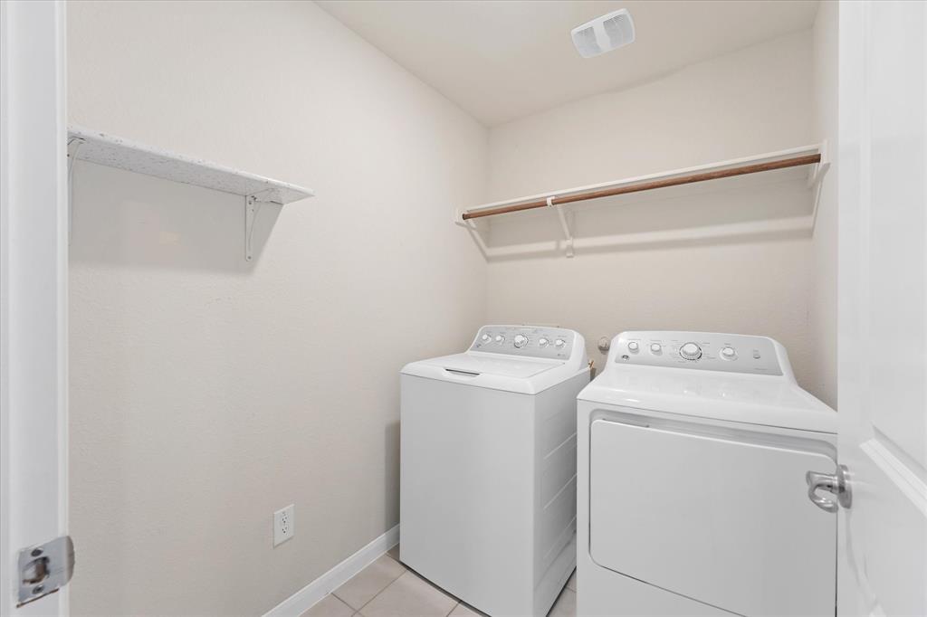 605 Spur Ridge Princeton, TX 75407 - Photo 24 of 30 a utility room with dryer and washer