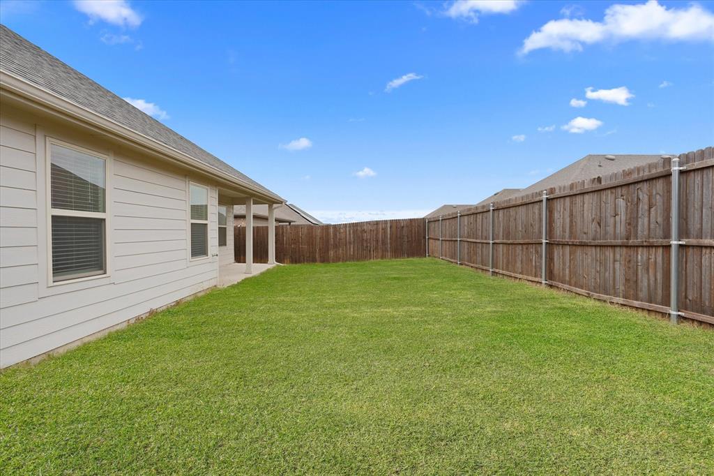 605 Spur Ridge Princeton, TX 75407 - Photo 27 of 30 a view of a backyard
