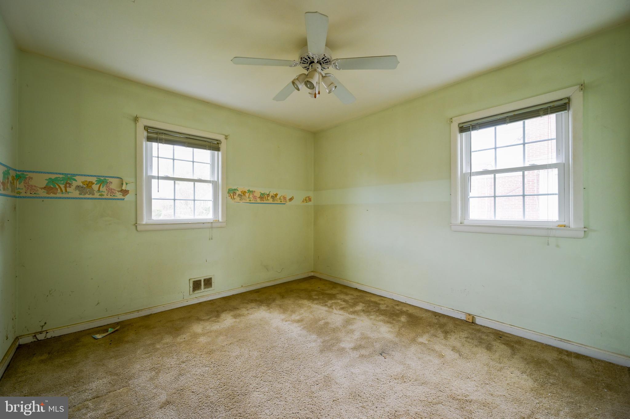 1518 Gridley Lane Silver Spring, MD 20902 - Photo 4 of 7 an empty room with a window
