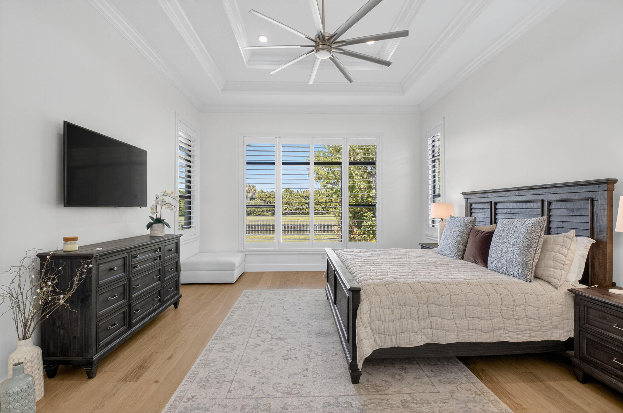 9331 Grand Prix Lane Boynton Beach, FL 33472 - Photo 23 of 96 a bedroom with a large bed and a flat screen tv