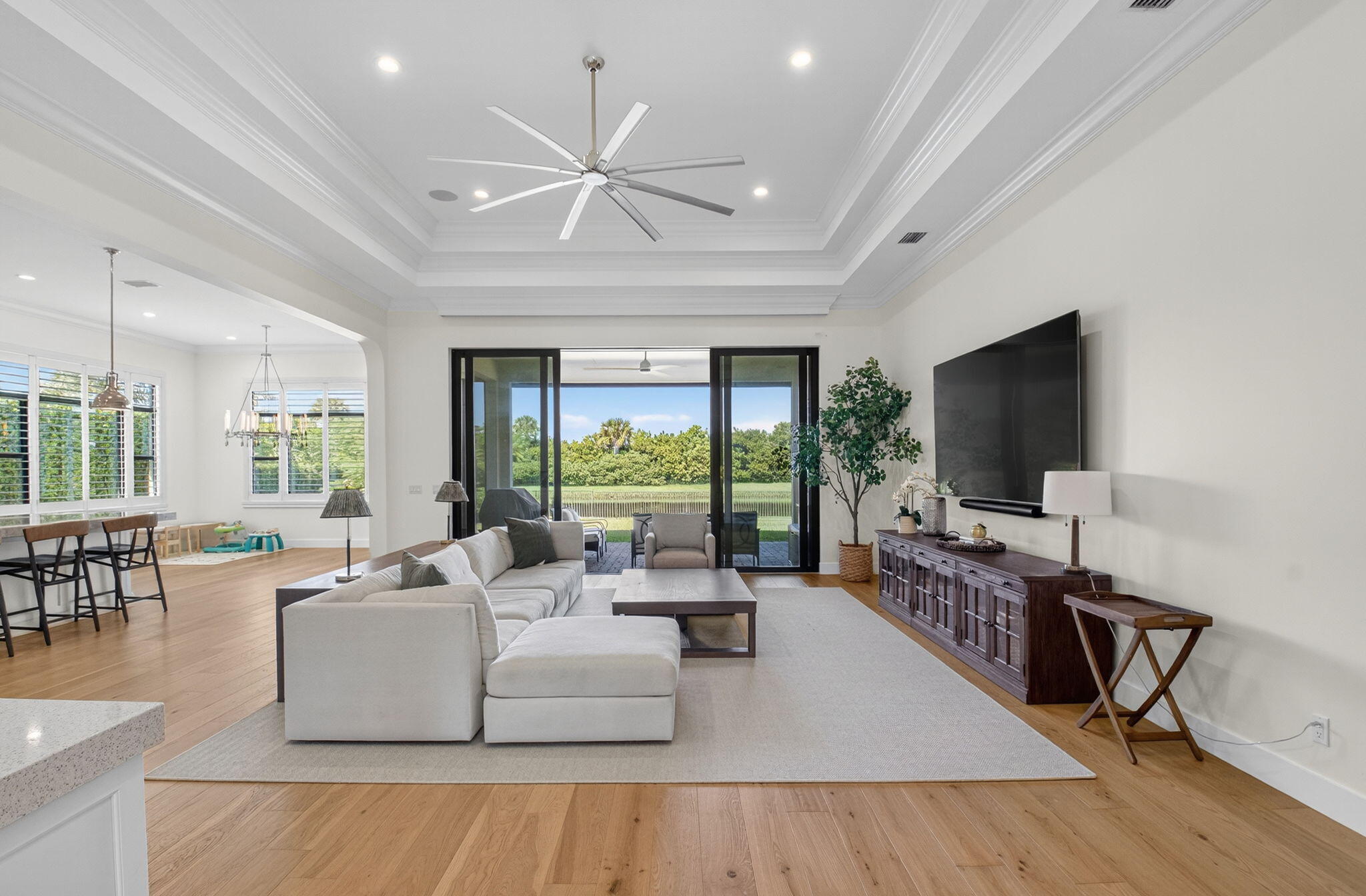9331 Grand Prix Lane Boynton Beach, FL 33472 - Photo 4 of 96 a living room with furniture and a flat screen tv