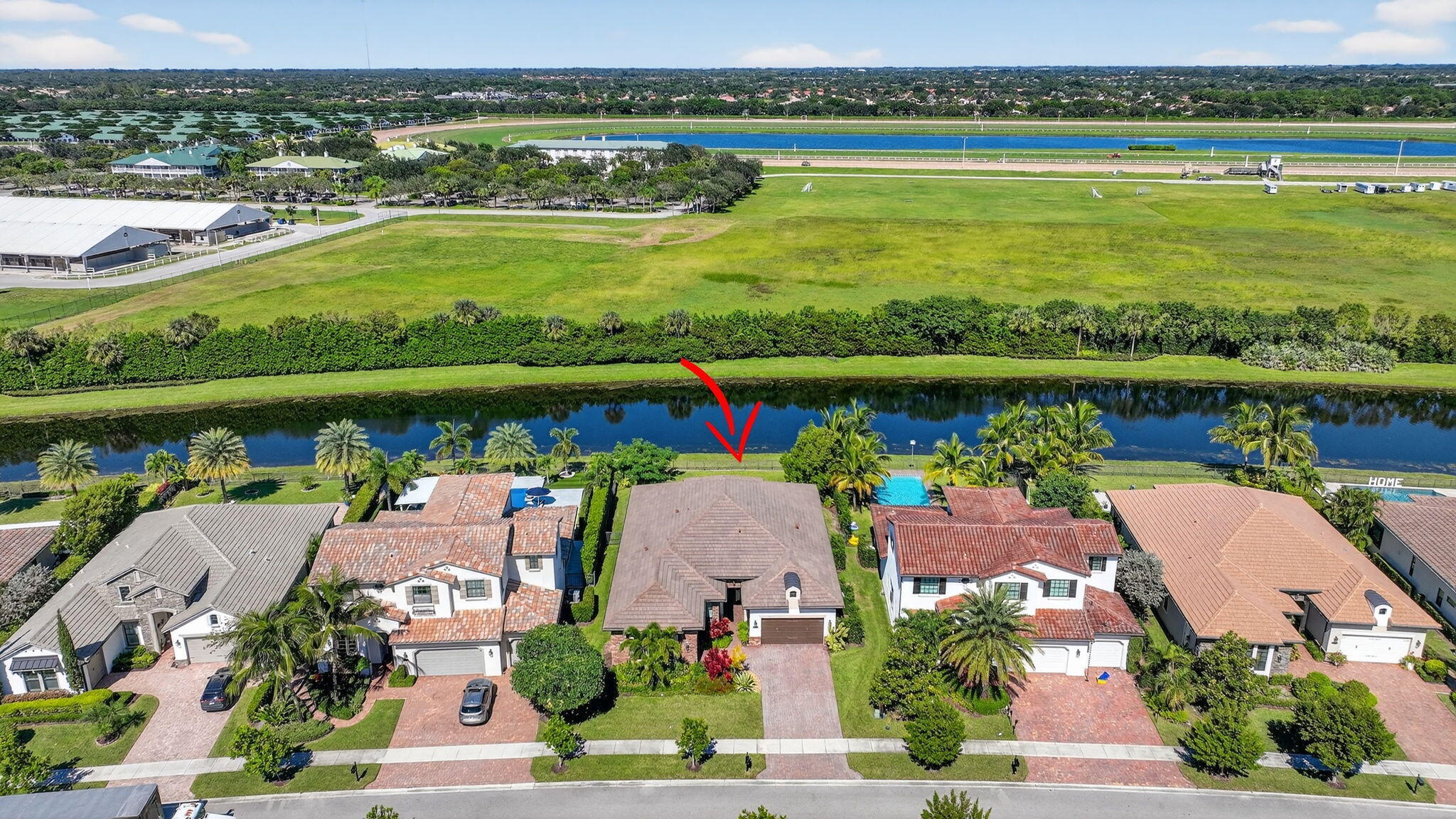 9331 Grand Prix Lane Boynton Beach, FL 33472 - Photo 54 of 96 an aerial view of a city with a lake view