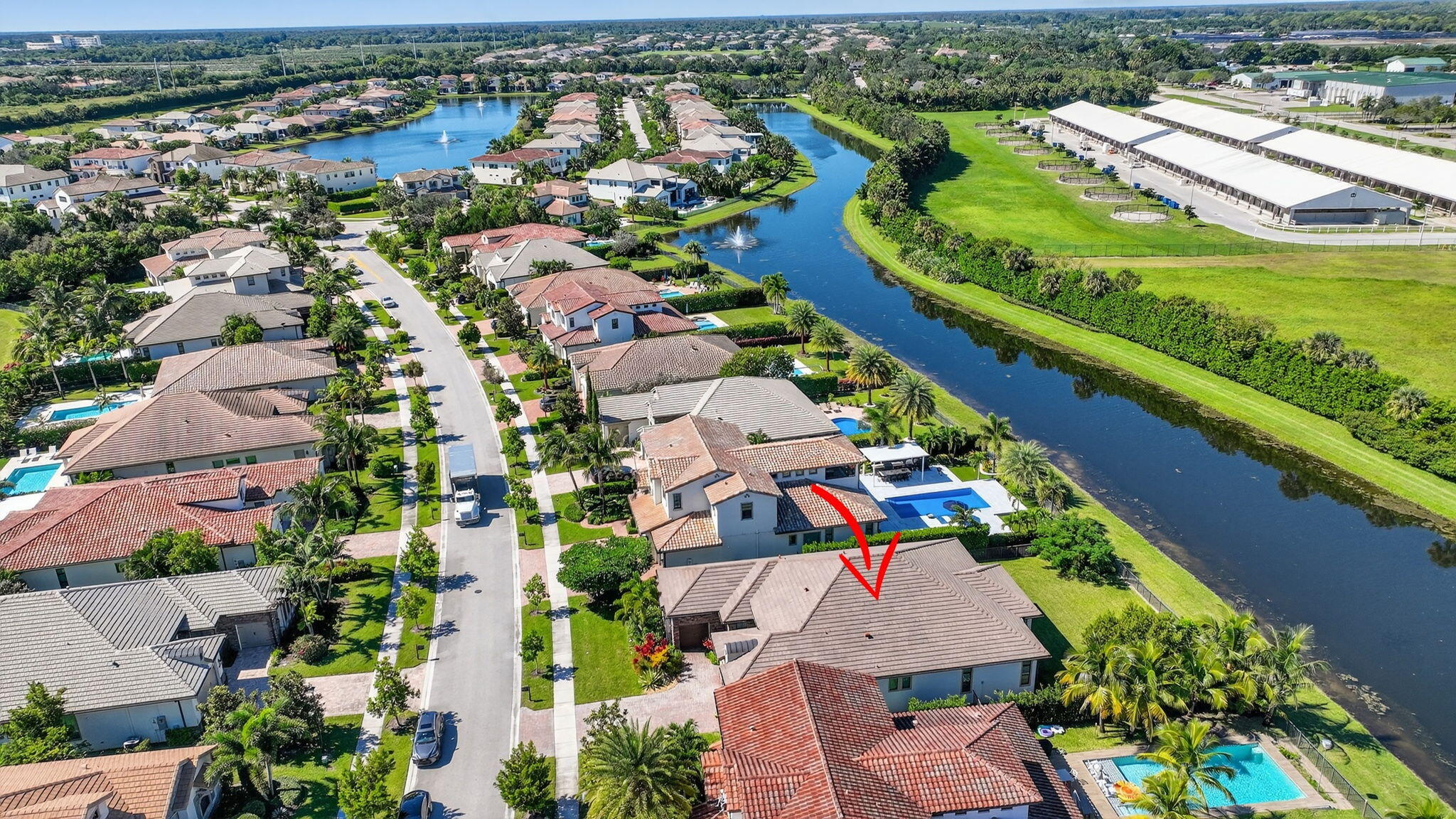 9331 Grand Prix Lane Boynton Beach, FL 33472 - Photo 56 of 96 an aerial view of residential houses with outdoor space and river view
