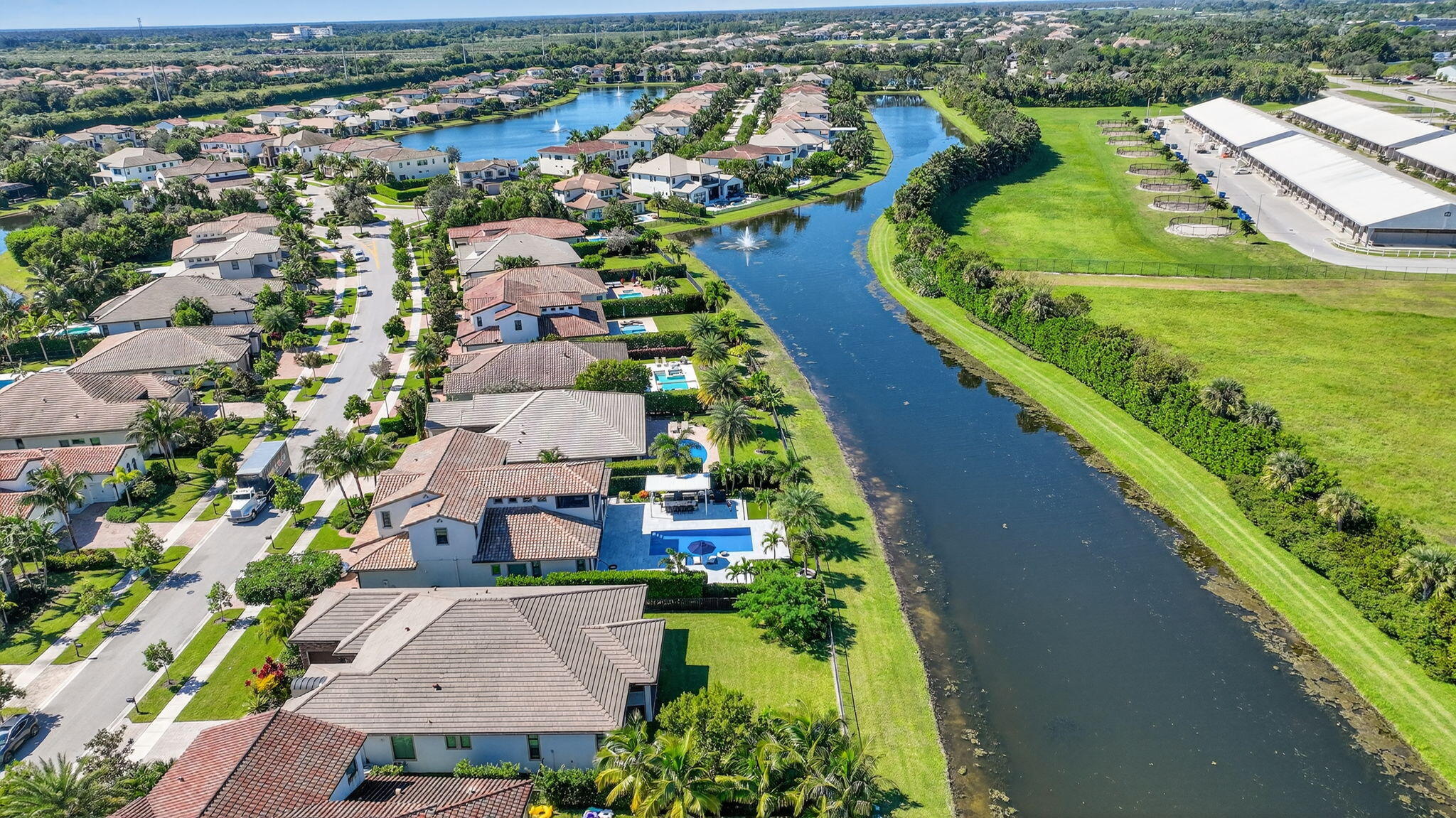 9331 Grand Prix Lane Boynton Beach, FL 33472 - Photo 58 of 96 an aerial view of a house with a garden