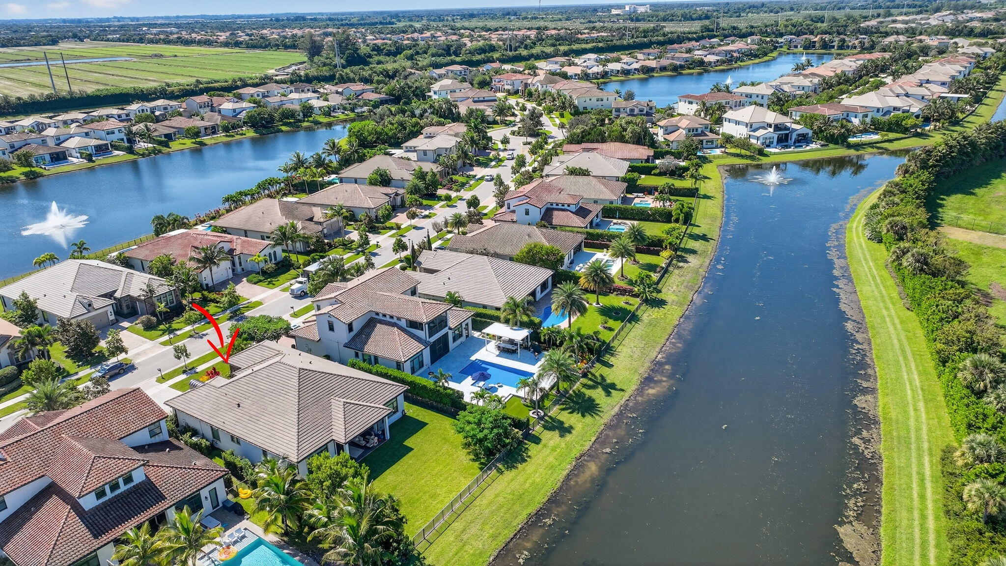 9331 Grand Prix Lane Boynton Beach, FL 33472 - Photo 59 of 96 an aerial view of residential houses with outdoor space and lake view