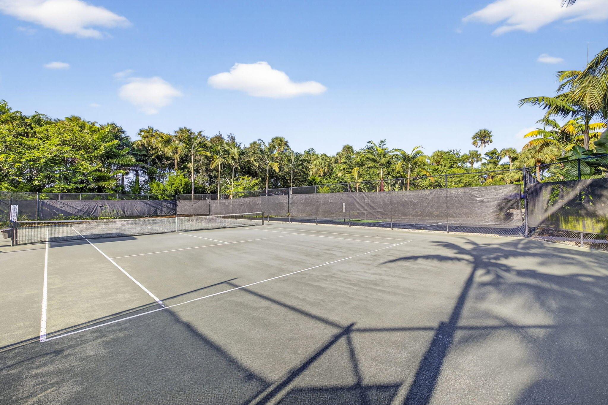 9331 Grand Prix Lane Boynton Beach, FL 33472 - Photo 86 of 96 a view of a tennis court