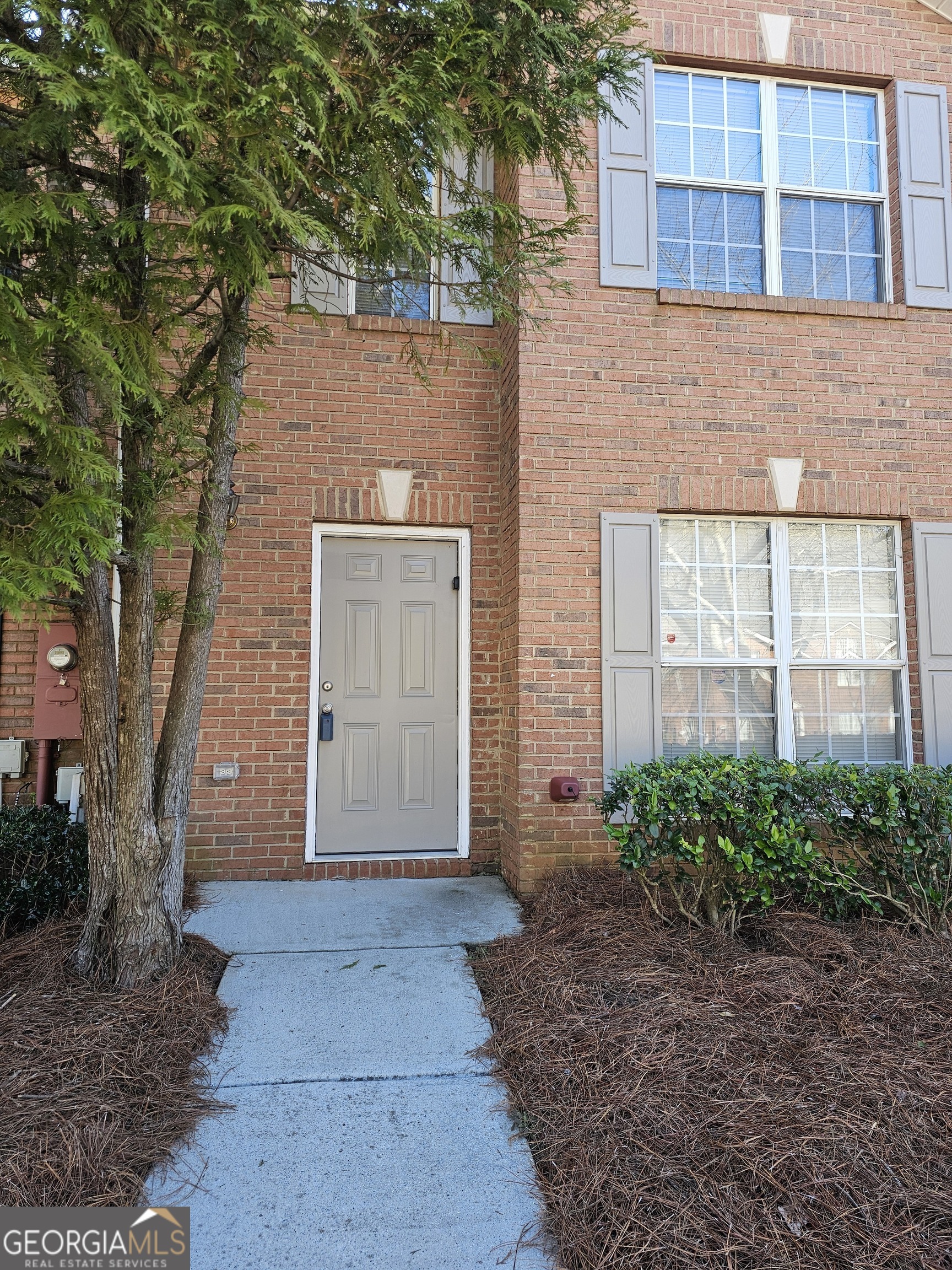 3788 Waldrop Lane, Unit 35 Decatur, GA 30034 - Photo 1 of 1 a front view of a house with a yard