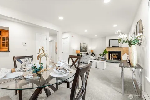 a view of a dining room with furniture