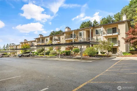 a view of a street with cars
