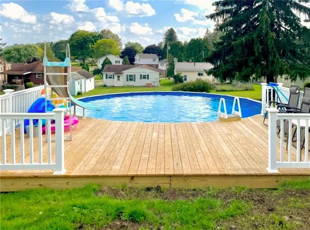 swimming pool with garden view