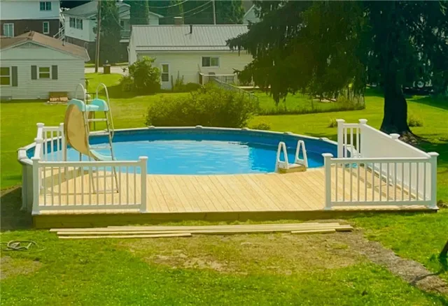a view of an house with a swimming pool