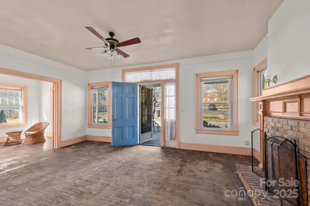 a view of livingroom with furniture window and fireplace