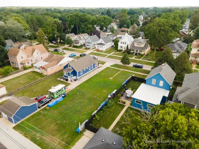 an aerial view of a pool patio patio and outdoor seating