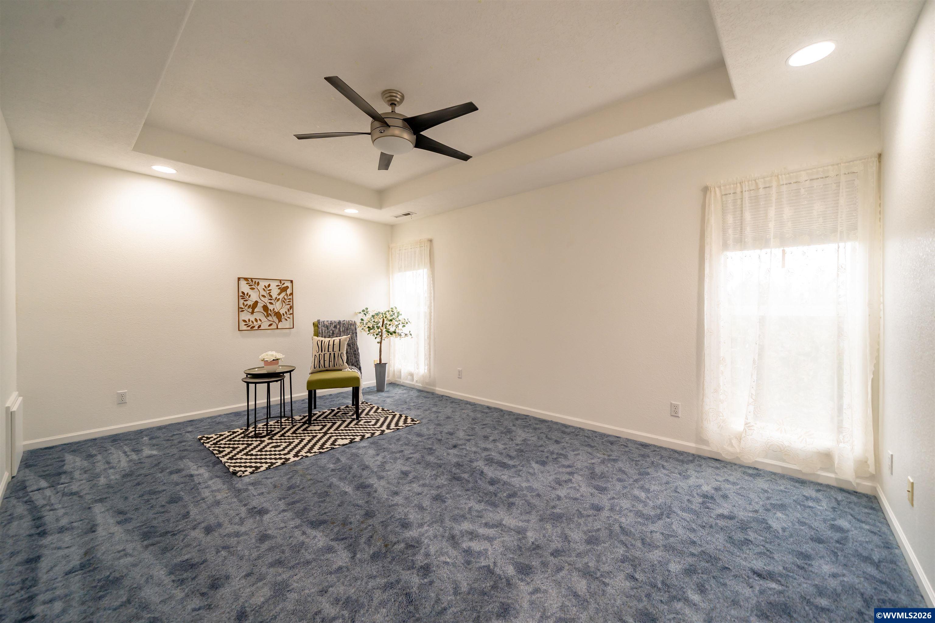 312 Southwest Cascade Meadow Drive Sublimity, OR 97385 - Photo 17 of 42 a view of a room with a window and wooden floor