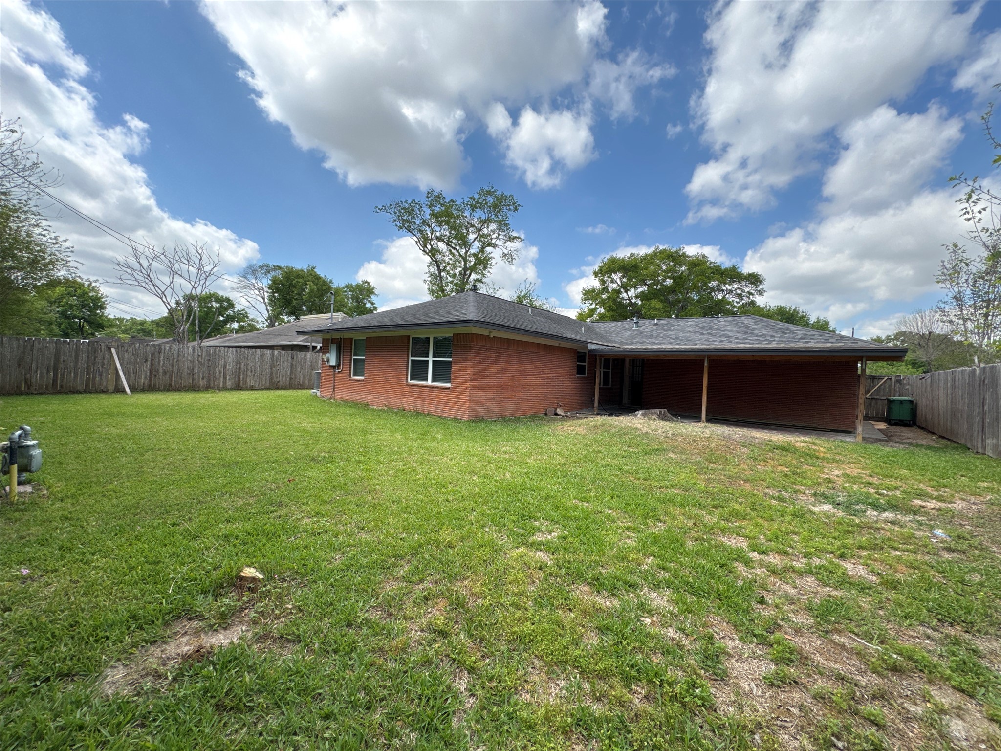 8733 Lugary Drive Houston, TX 77074 - Photo 28 of 30 a front view of a house with garden