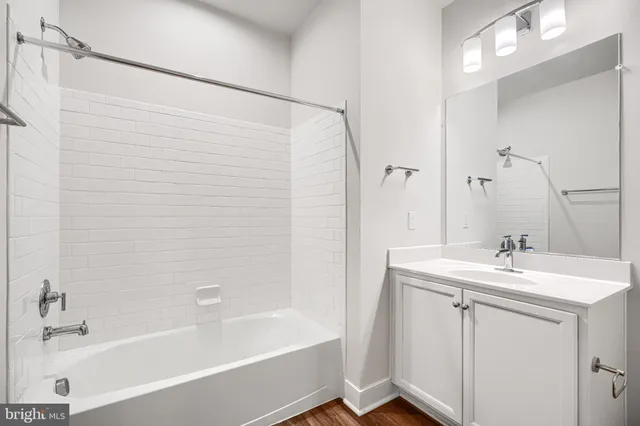 a bathroom with a sink and a bathtub