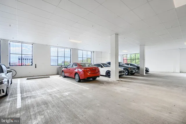 a view of a livingroom with furniture and window
