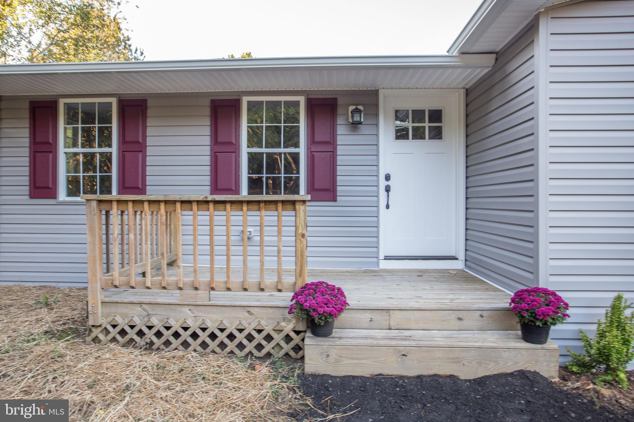 5601 Cherry Hill Road Huntingtown, MD 20639 - Photo 32 of 37 a front view of a house