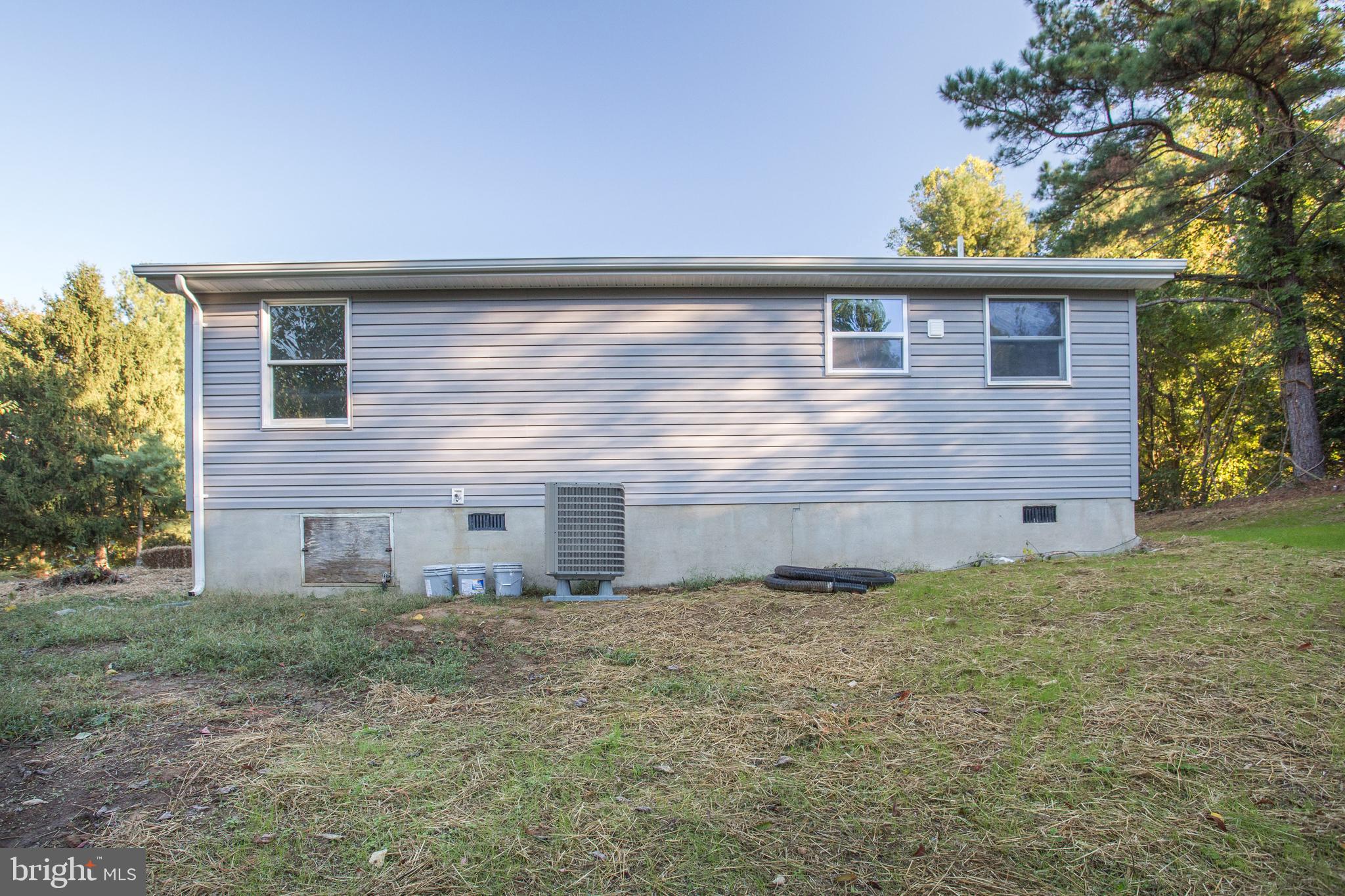 5601 Cherry Hill Road Huntingtown, MD 20639 - Photo 35 of 37 a front view of house with yard