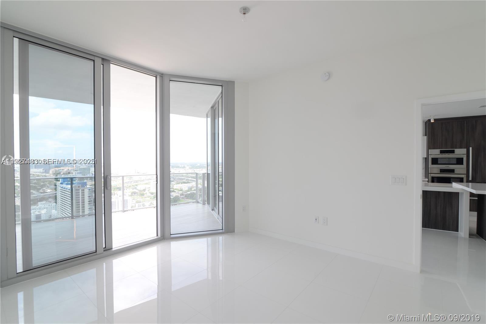 851 Northeast 1st Avenue, Unit 4110 Miami, FL 33132 - Photo 8 of 9 a view of an empty room with a window