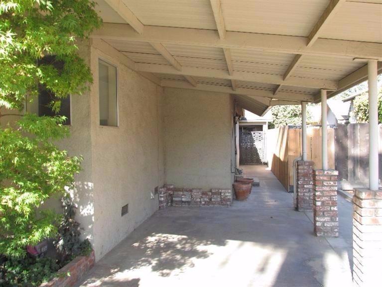 145 North Reed Avenue Reedley, CA 93654 - Photo 22 of 23 One Car Carport on side of home