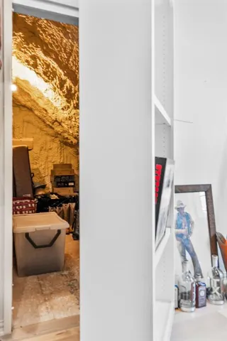 a view of living room with furniture and a flat screen tv